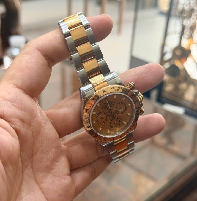 Rolex daytona 116523 mặt sam banh giá 390 triệu