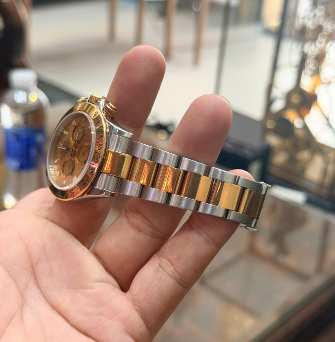 Rolex daytona 116523 mặt sam banh giá 390 triệu